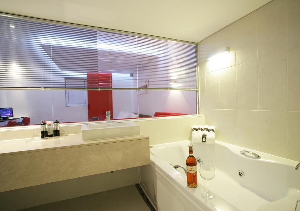 Antives Hotel Коян Номер фото